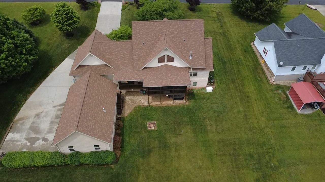Drone view of a Seymour, TN home with a new Owens Corning Duration roof in Desert Rose
